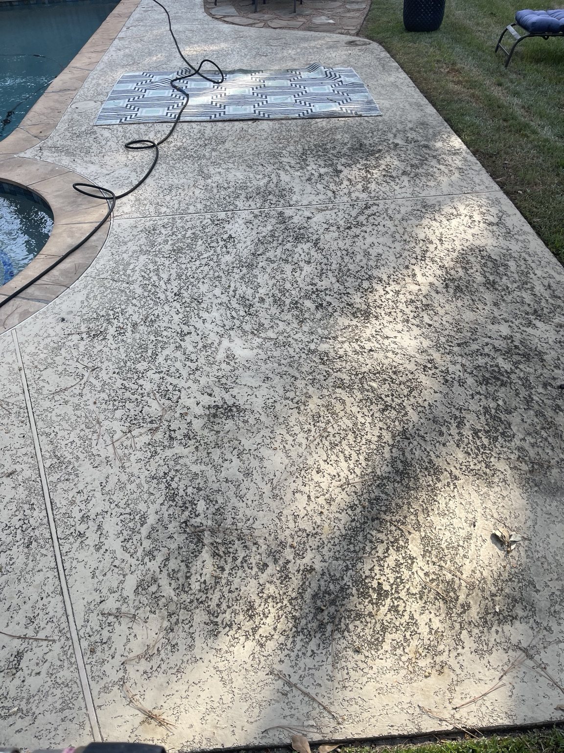 Before: pool deck cleaning