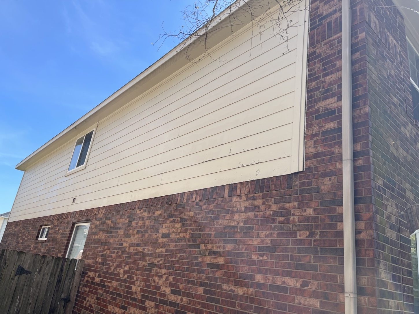 After soft washing: brighter and cleaner home siding